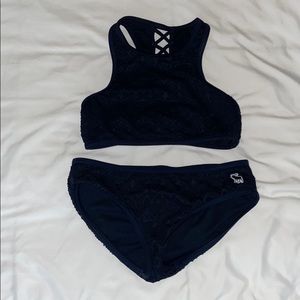 Girls navy blue two piece swimsuit.